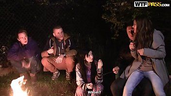 Play Sex in the woods at a campfire with many couples