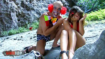 Play Crazy clown bestially penetrates a teenager who doesn't really know how to do sex